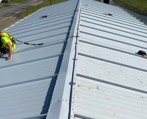 Installation of Metal Wall Panels and Insulated Roof Panels at NASA Michoud Assembly Facility, B450