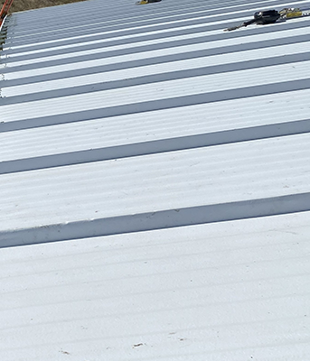 Installation of Metal Wall Panels and Insulated Roof Panels at NASA Michoud Assembly Facility, B450